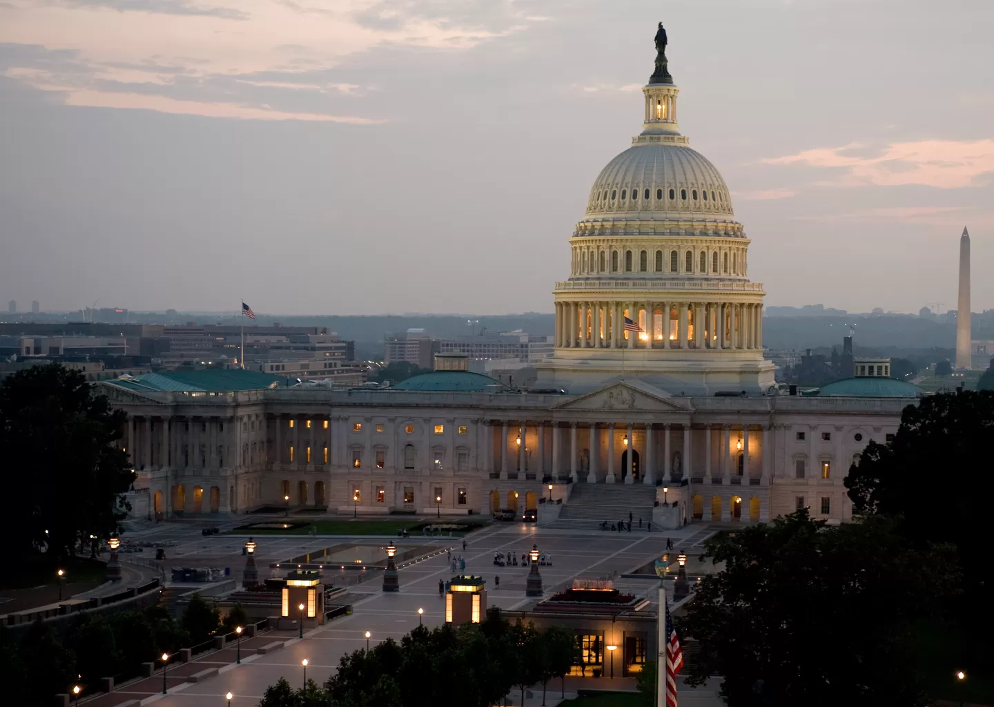 The United States Capitol illuminated at dusk